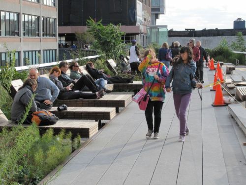 Reclining chairs along the High Line lead to socializing
